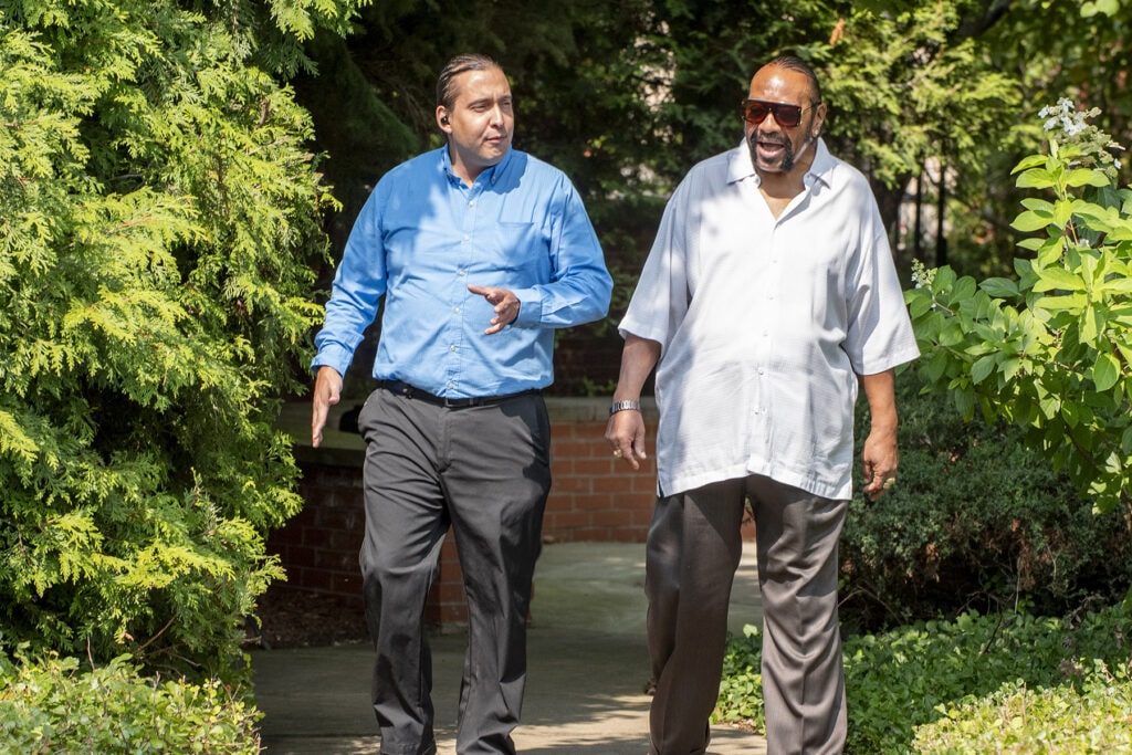 Two men talking at St. Leo Residence for Veterans