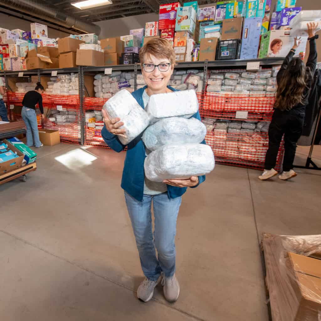 Woman holding diapers at the Diaper Depot in Round Lake, IL