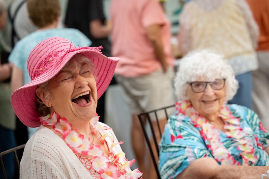 Carol Bradley Clooney, 77, at the luau. Senior luau in Ingleside, Illinois.