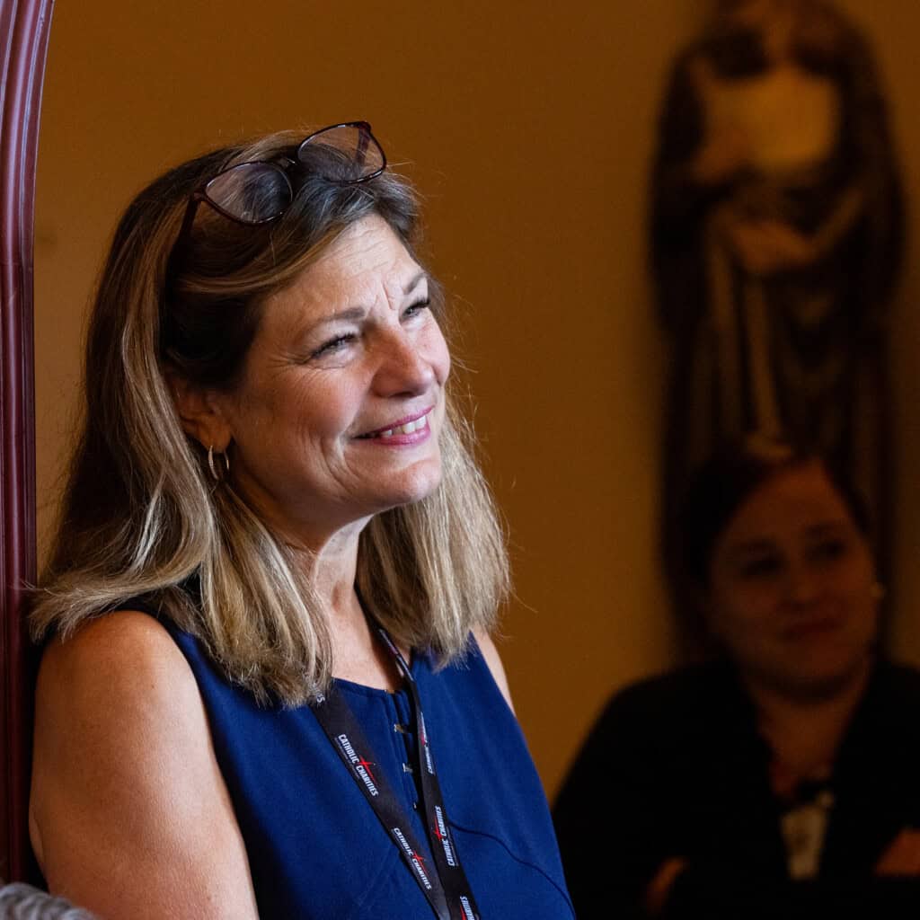 Lisa Francis smiling at the St. Vincent adoptee reunion mass.