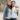 Portrait of mother and son ready to go to school. Hispanic mother and son outside school.