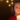 Child holding a lit candle