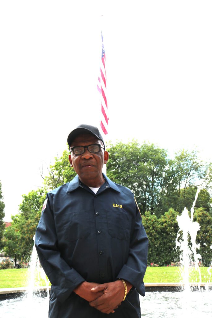 Edmund Flowers in front of a fountain