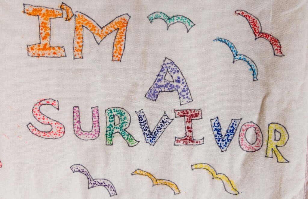 Closeup shot of children's art on quilt in the House of Good Shepherd