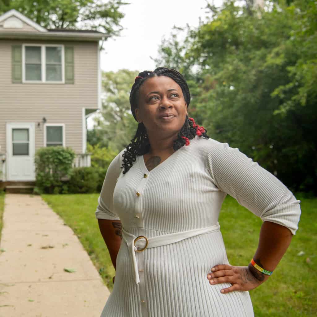 Family Self Sufficiency Program graduate Ashley Reynolds photographed in front of her home