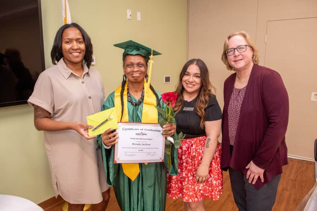 Family Self Sufficiency Program graduate Brenda Jackson group photo at graduation