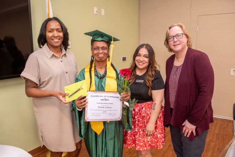 Family Self Sufficiency Program graduate Brenda Jackson group photo at graduation
