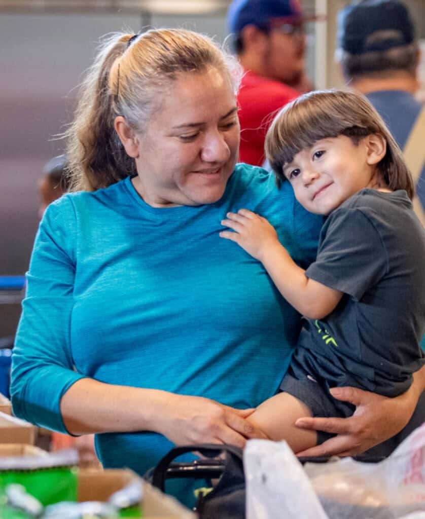 Woman holding her son