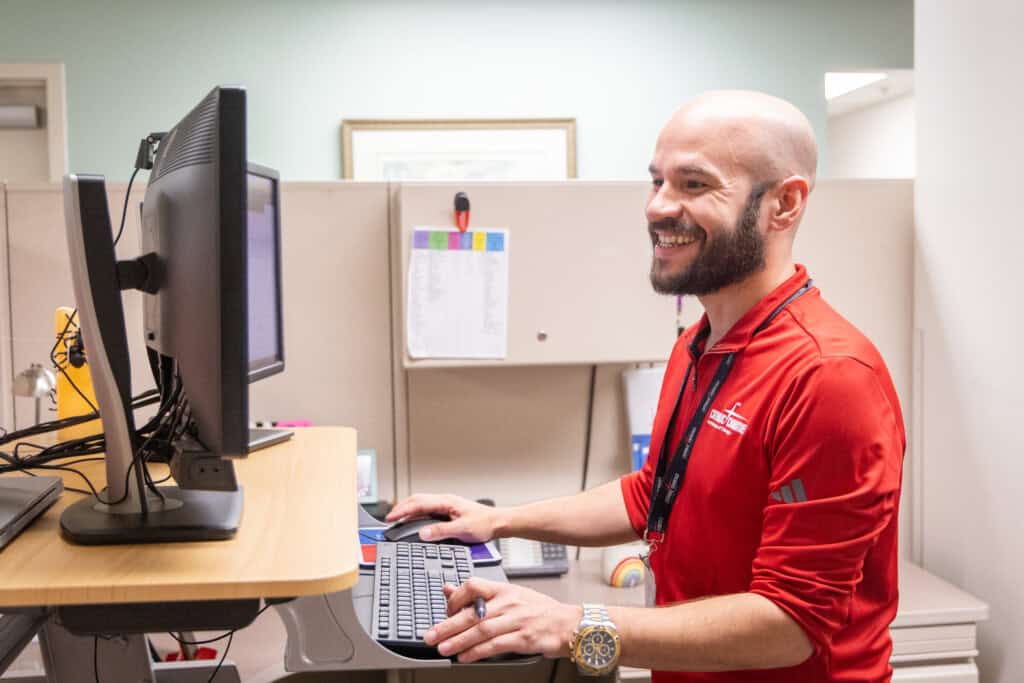 Joseph Candelaria working at Waukegan Office