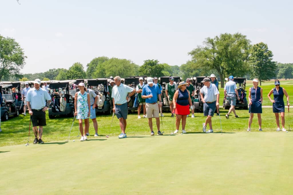 Golfers lined up to tee off