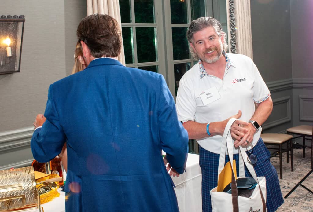 Golf Classic attendees smiling